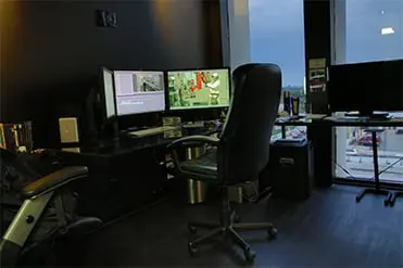 office chair and two monitors on the desk